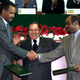 Algerian President Abdelaziz Bouteflika (C) stands between Eritrean President Isayas Afewerki (L) who shakes hands with Ethiopian Prime Minister Meles Zenawi (R) after signing peace agreements December 12, 2000. Ethiopia and Eritrea formally ended their two-year border war after months of mediation by the Organisation of African Unity (OAU), the United Nations and the United States. - PBEAHULFNBJ